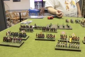 After a few rounds of ineffective artillery fire, Adam starts the real fighting by advancing his cavalry on my left.